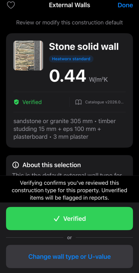 Heatworx review screen for the external wall default: Stone solid wall, Heatworx standard, 0.44 W/m²K, Verified, Catalogue version, with the build-up listed as sandstone or granite 305 mm, timber studding 15 mm plus EPS 100 mm plus plasterboard, 3 mm plaster, and a green Verified button